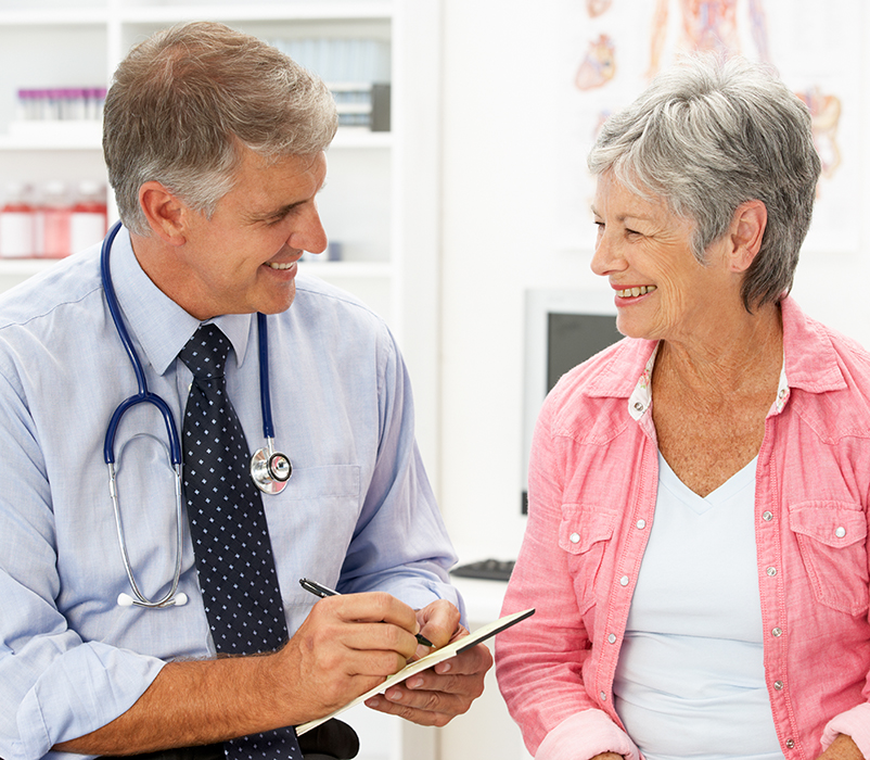 Doctor with female patient